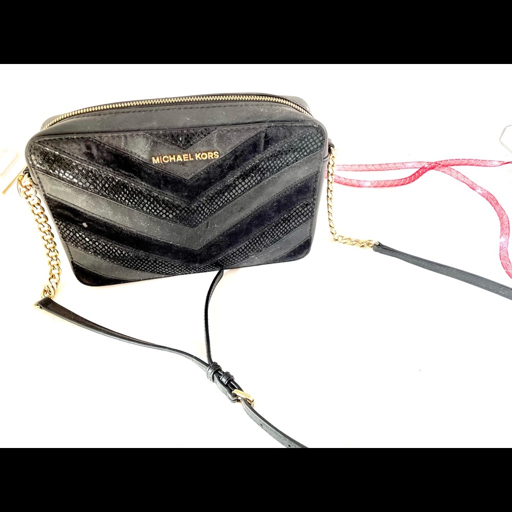 Michael Kors Crossbody black leather bag with gold hardware.